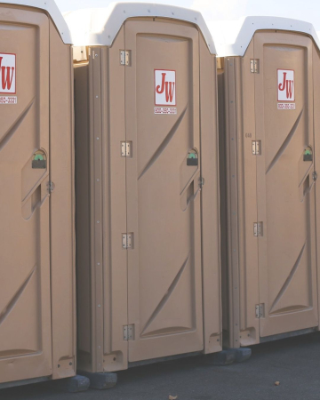 JW Mobile Website Porta Potty Hero Image of 3 Portable Toilets