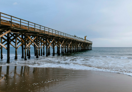 Wooden pier stretching into the Pacific at Gaviota State Park in Gaviota, California